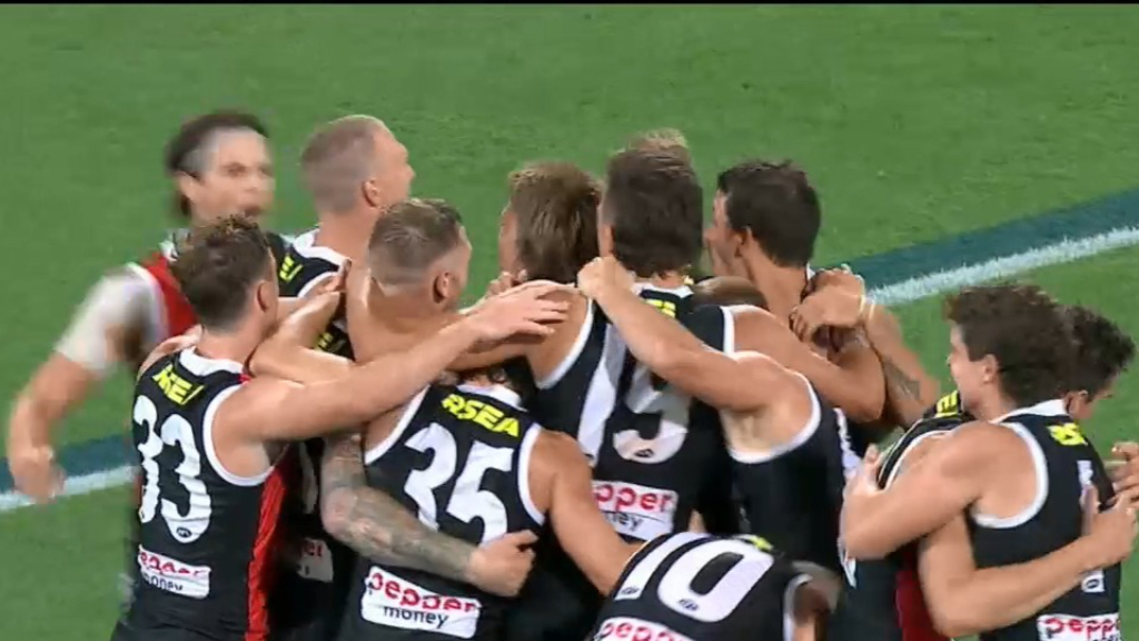 Pies beat Eagles, Saints down Dogs in finals