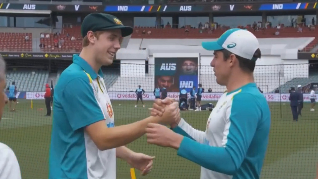 Cummins presents Green with Australian cap