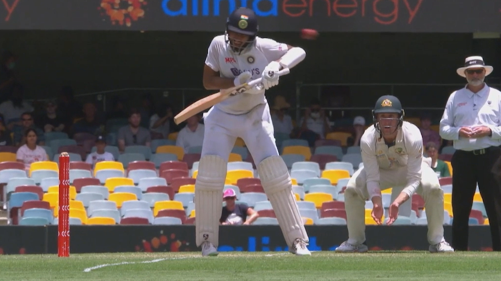 Cummins pins Pujara