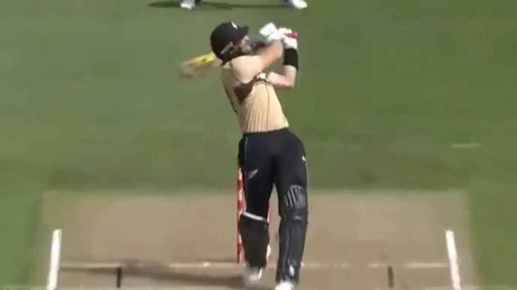 Guptill all the way for six