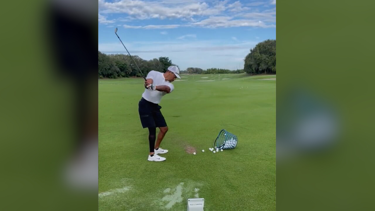 Woods seen swinging a golf club for first time since accident