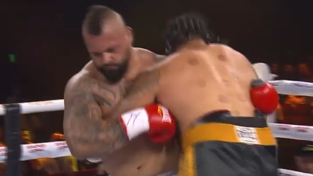 Strongman disqualified from boxing bout after tripping opponent