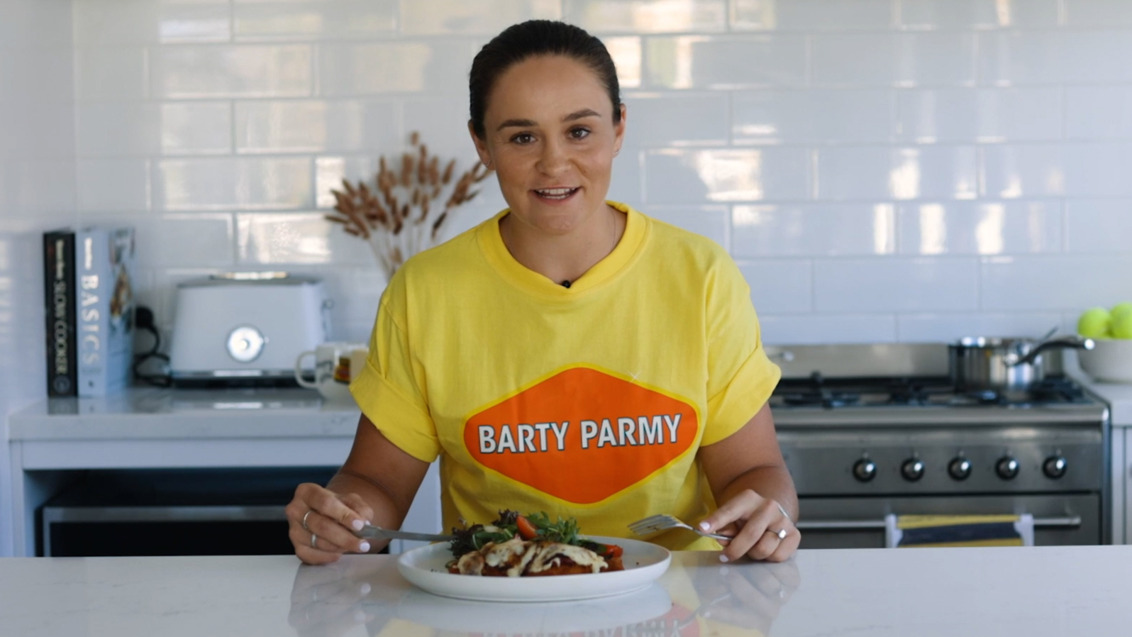 Ash Barty unveils "unofficial dish" of the Australian Open, a chicken parmy with a twist