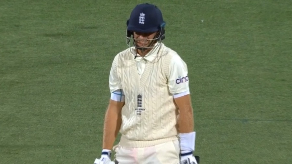 Scott Boland bowls Joe Root