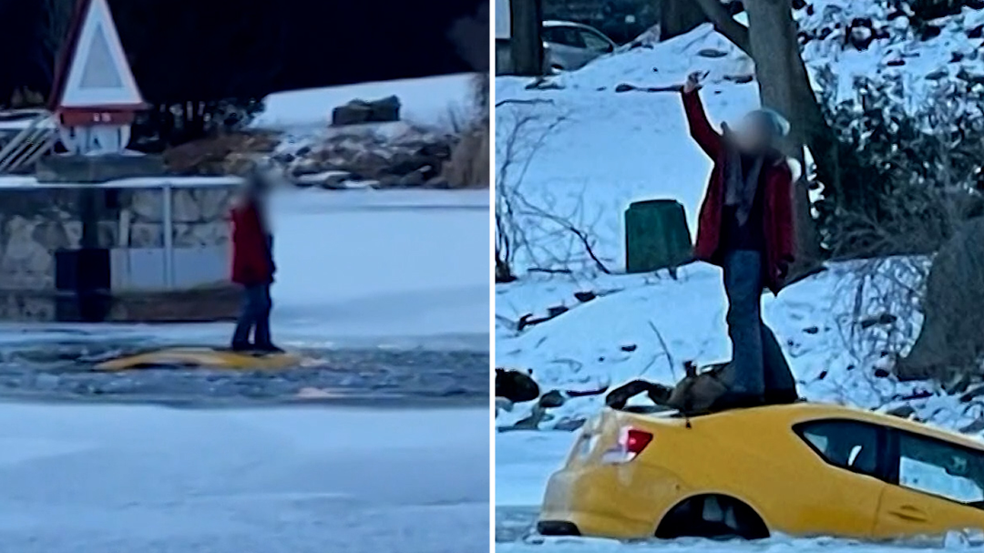 Woman takes selfie as car sinks down frozen river