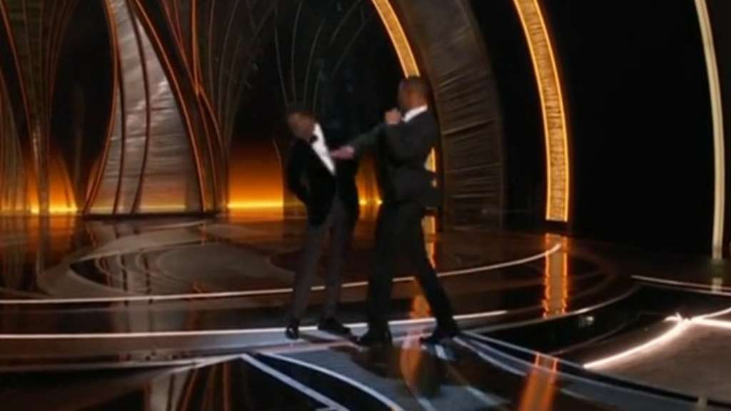 Actor Will Smith slaps Oscar host Chris Rock after joke about his wife