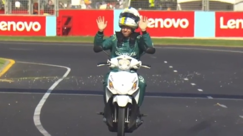 Priceless scenes as Vettel rides scooter around Albert Park Circuit