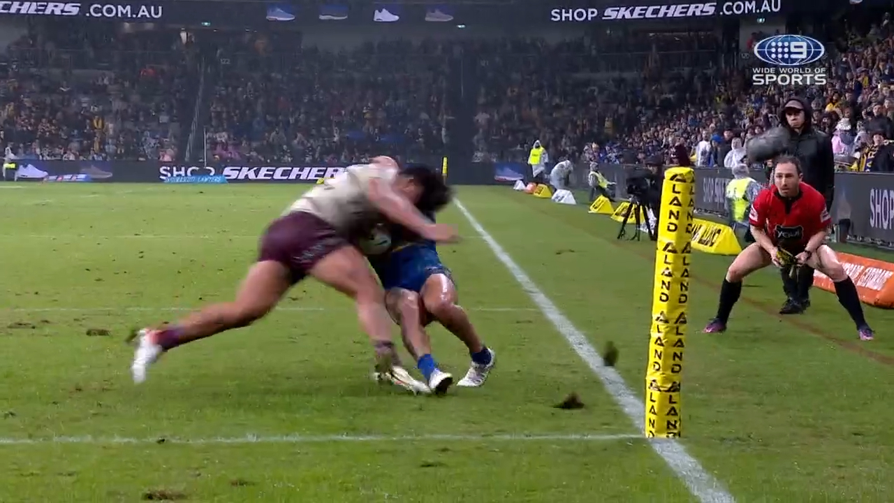 Manly's Christian Tuipulotu is pulled up for a high tackle