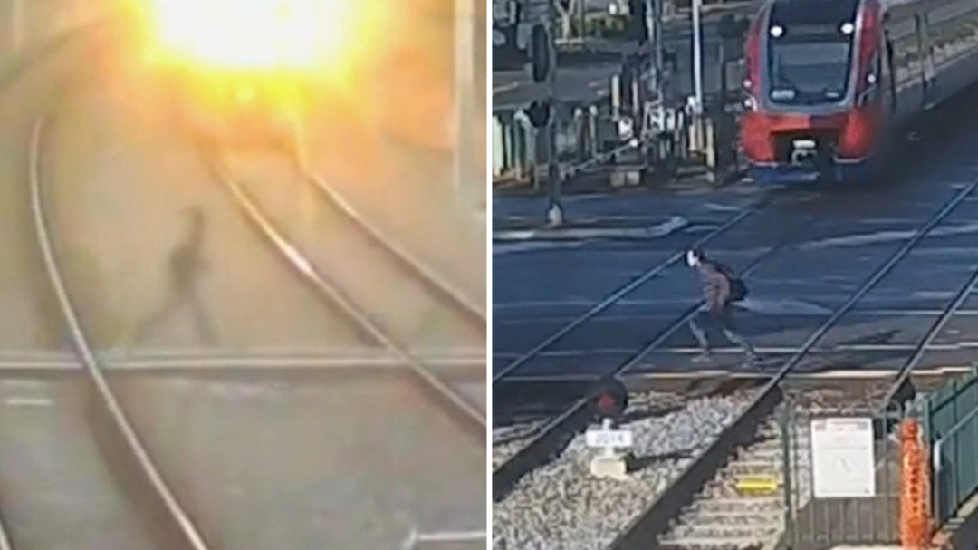 Pedestrians dicing with death by running across train tracks