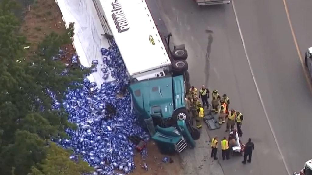 Beer truck spills cargo across US highway
