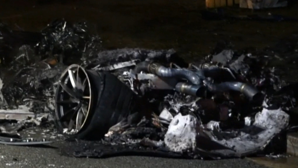 Man and woman pulled from burning McLaren supercar after crashing on Gold Coast