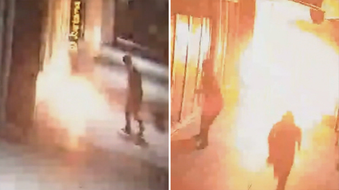 CCTV captures two men fleeing Melbourne restaurant fire