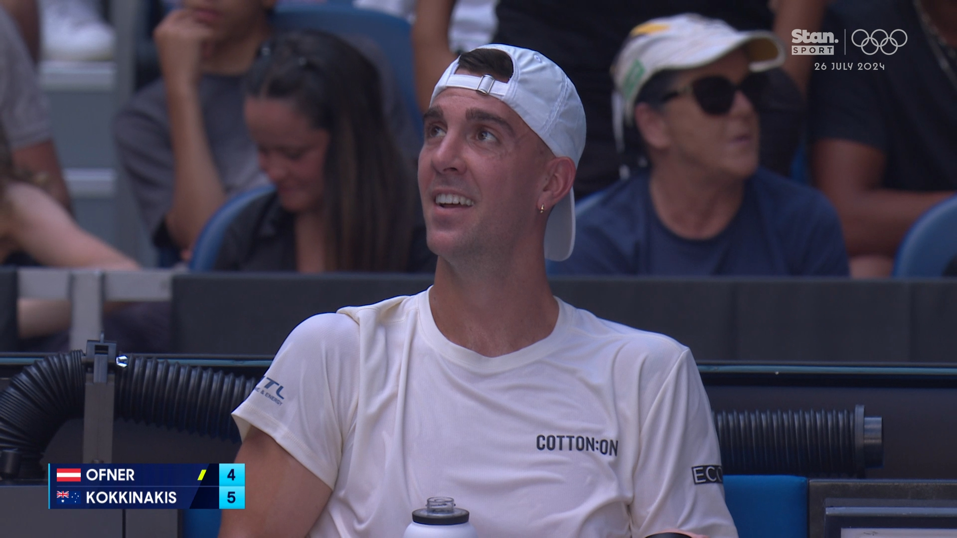 Kokkinakis grills umpire at change of ends