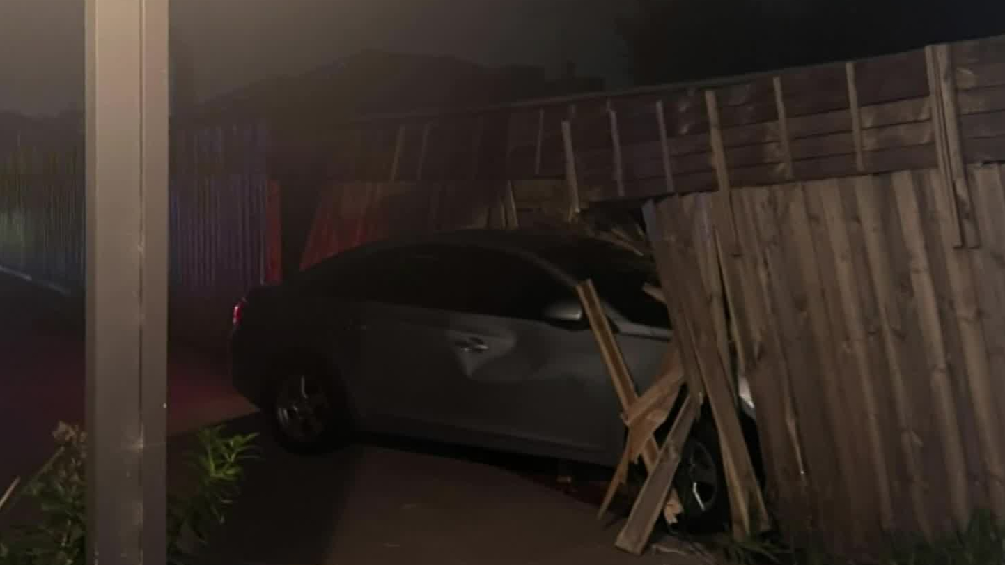 Man arrested after 'ramming stolen car into fence' in Melbourne