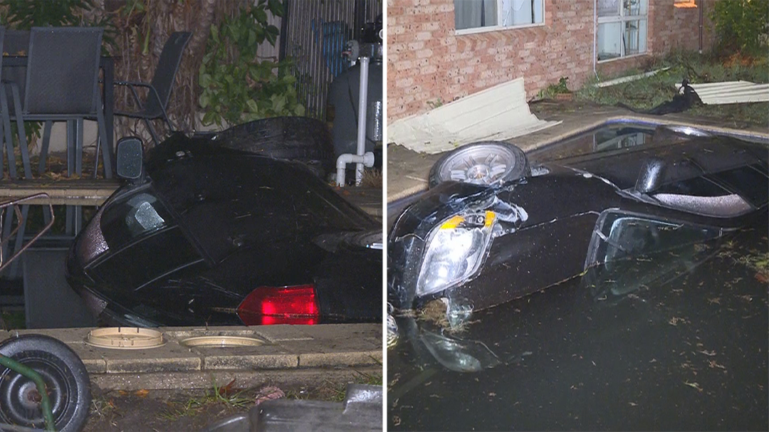 Driver escapes after plunging car into pool