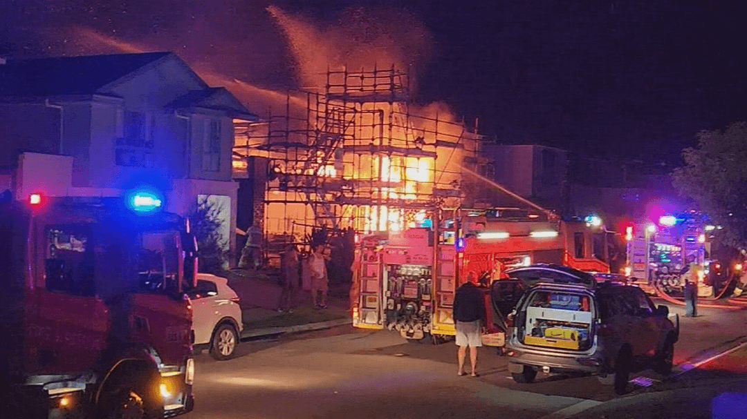 Two teens charged after fire destroys homes under construction in Brisbane