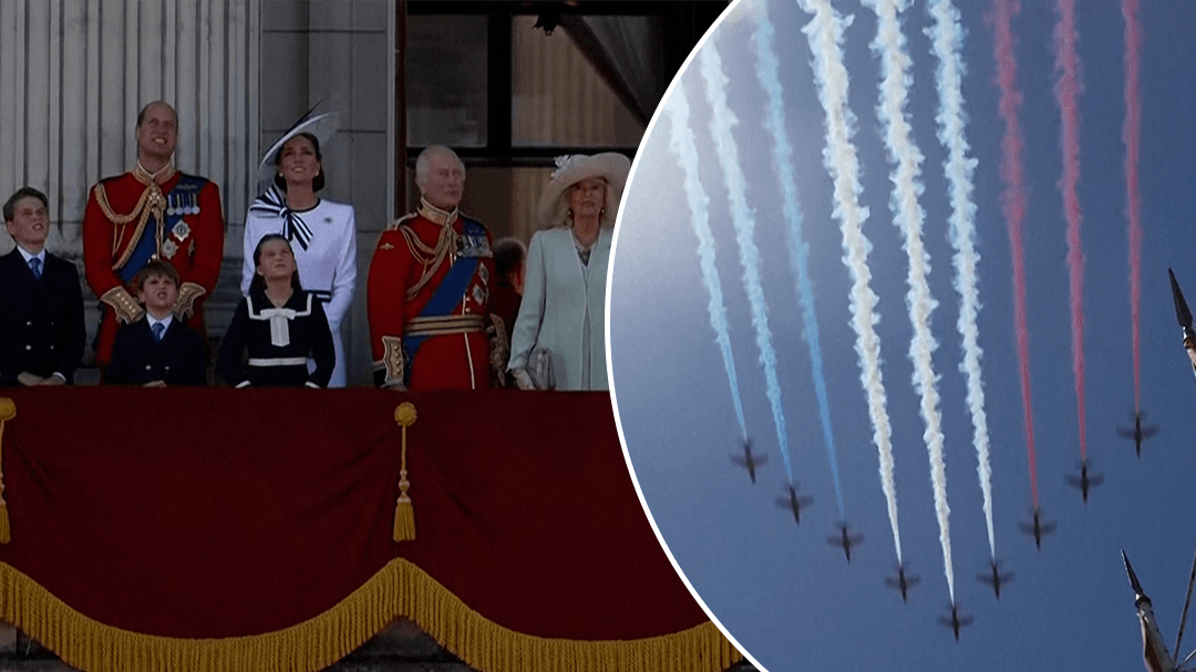 King and family watch fly-past on Buckingham Palace balcony