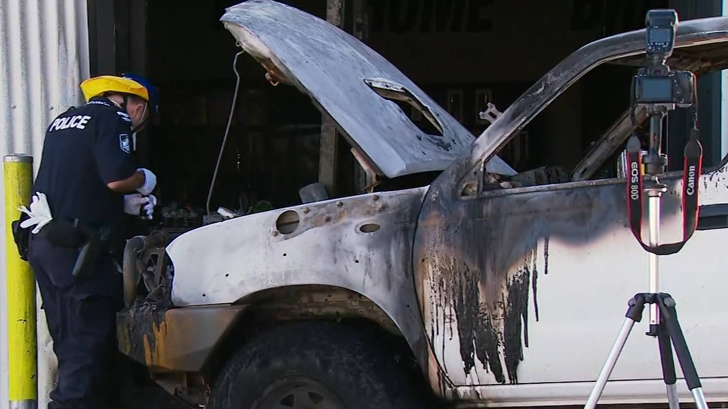 Police investigate after ute smashes into tobacco shop in Queensland